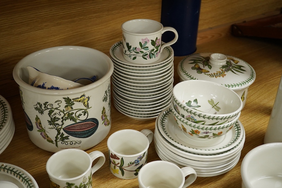 A quantity of Portmeirion tableware to include oval dishes, cups, saucers and dinner plates. Condition - mostly fair, some cracks